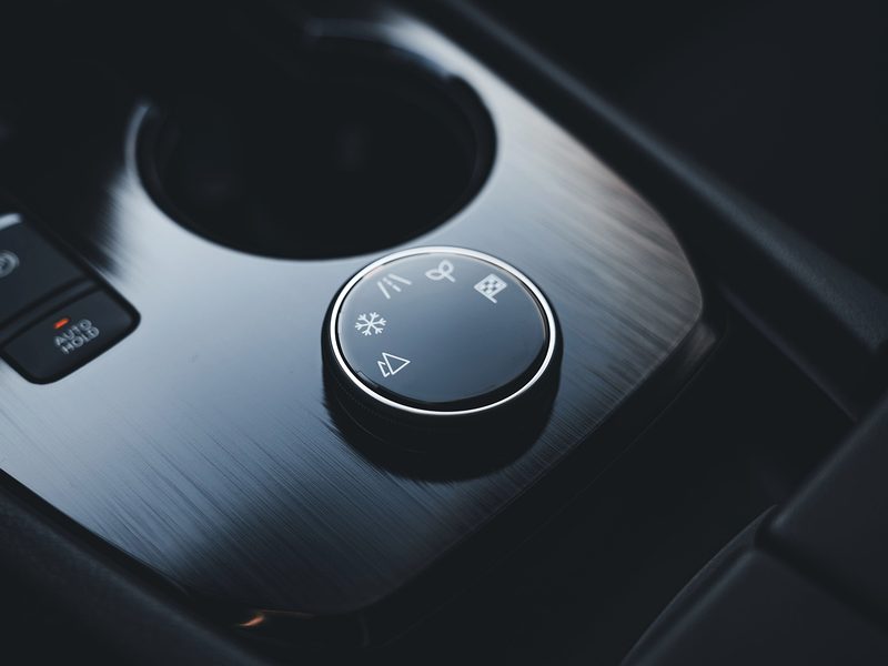 Grime around car dashboard buttons and controls